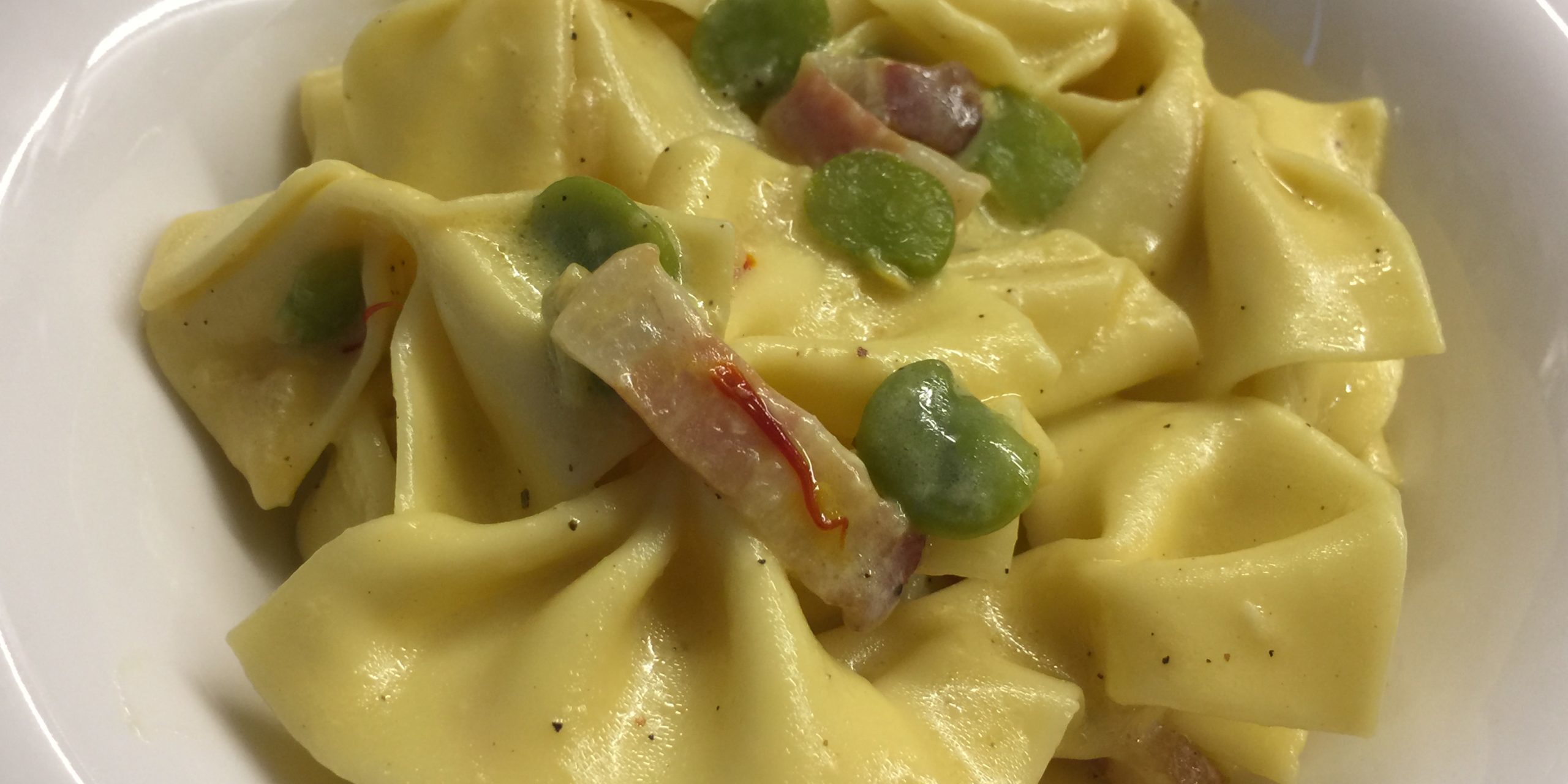 Farfalle Di Pasta Fresca All Uovo Con Fave Zafferano Pancetta E Pecorino Il Giuggiolone